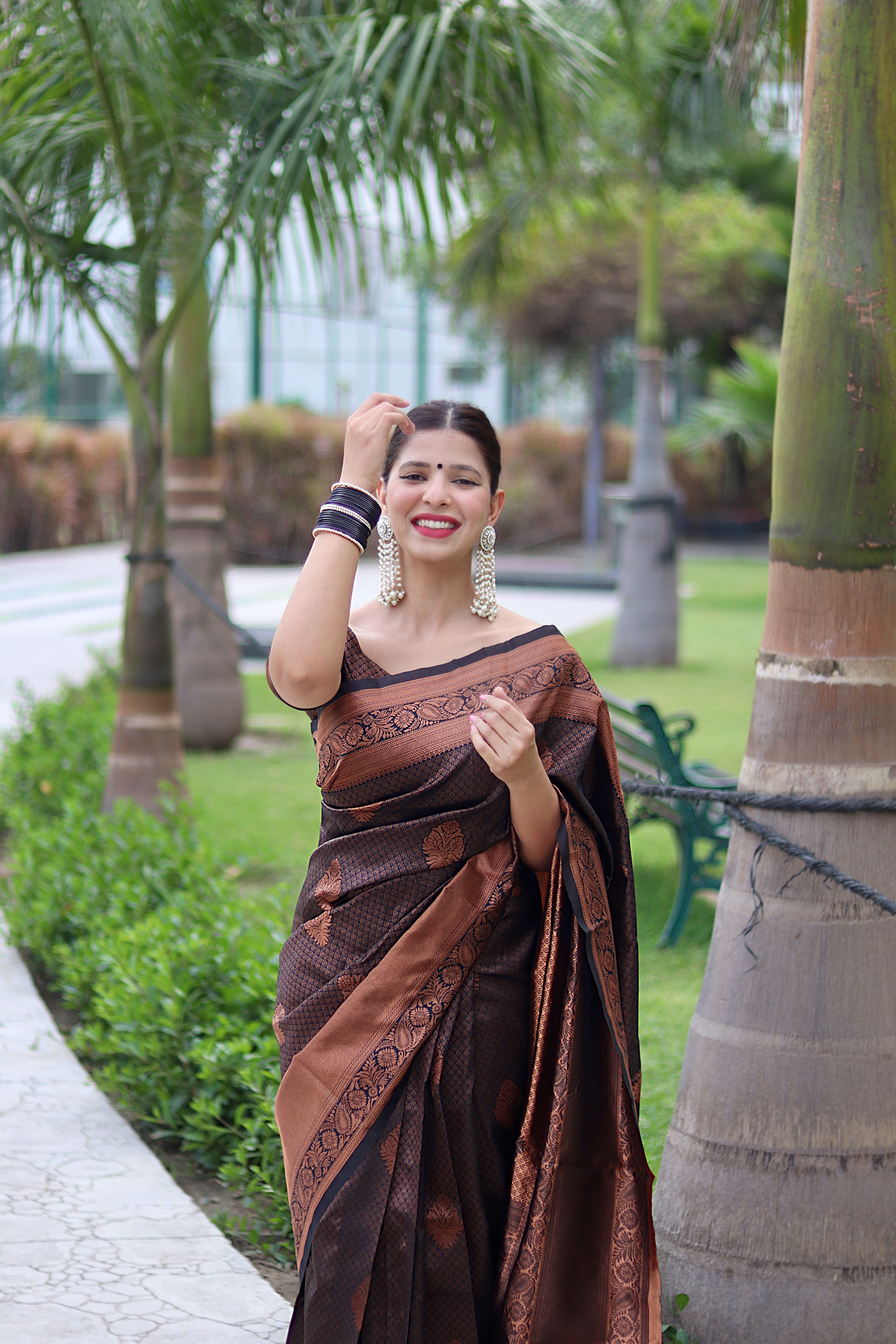 Fascinating Black Banarasi Silk Saree With Winsome Blouse Piece