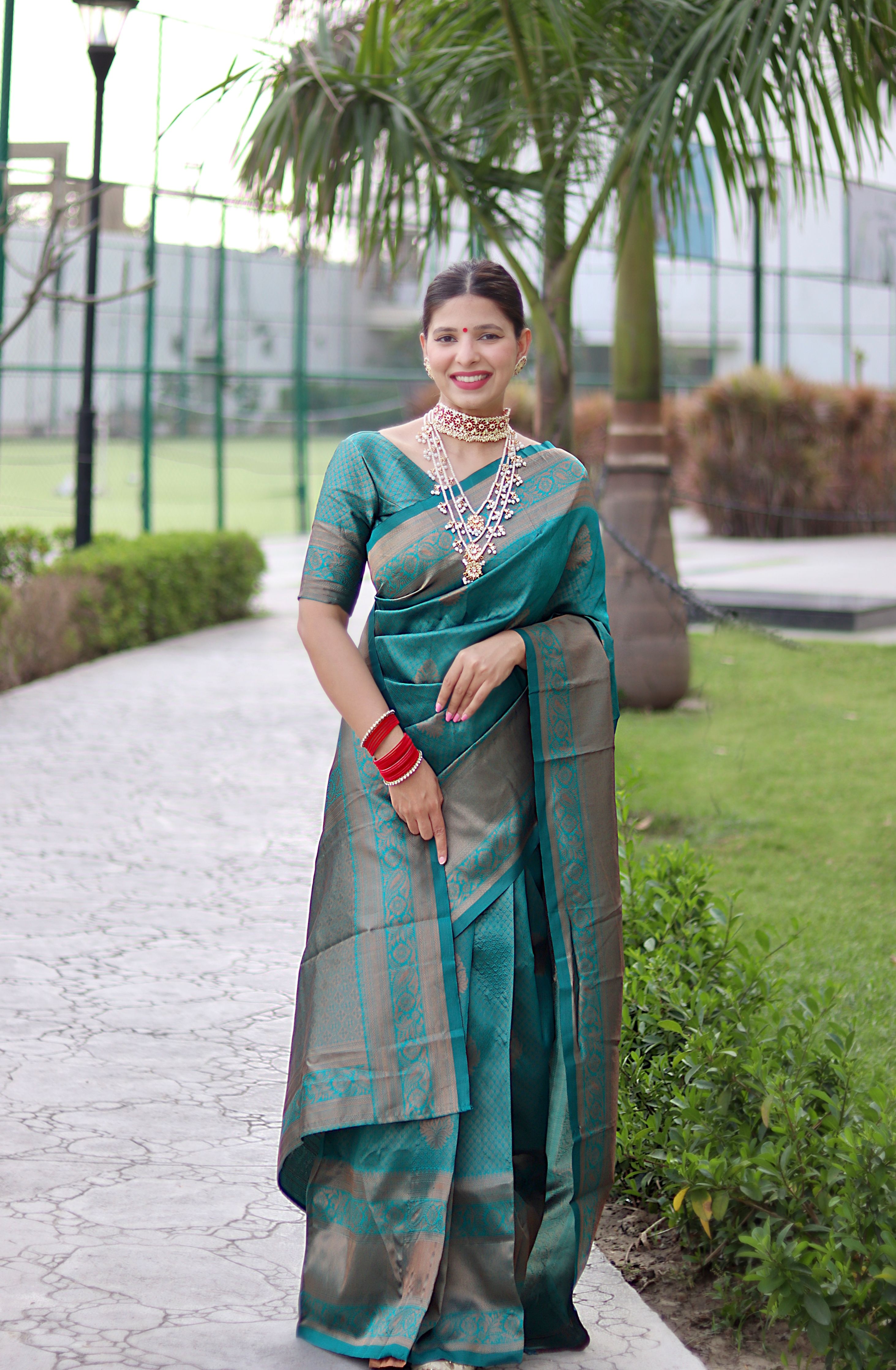 Striking Rama Banarasi Silk Saree With Bewitching Blouse Piece