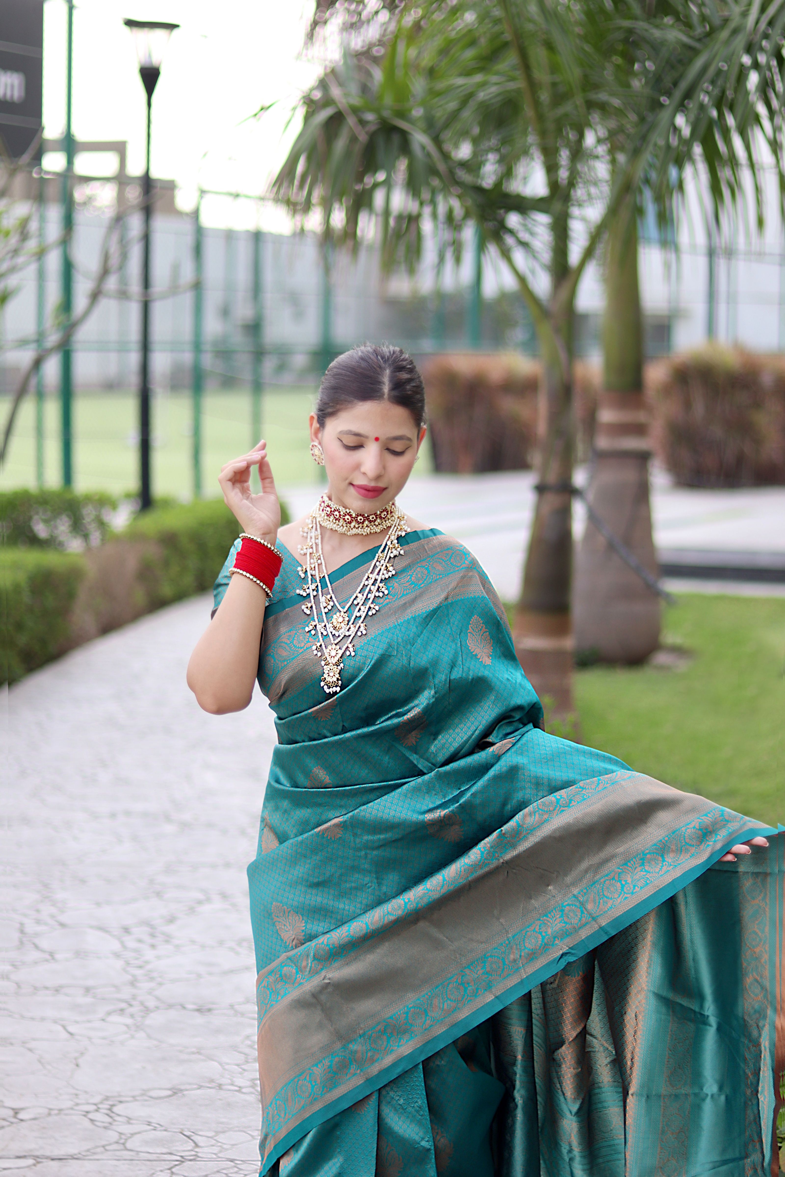 Striking Rama Banarasi Silk Saree With Bewitching Blouse Piece