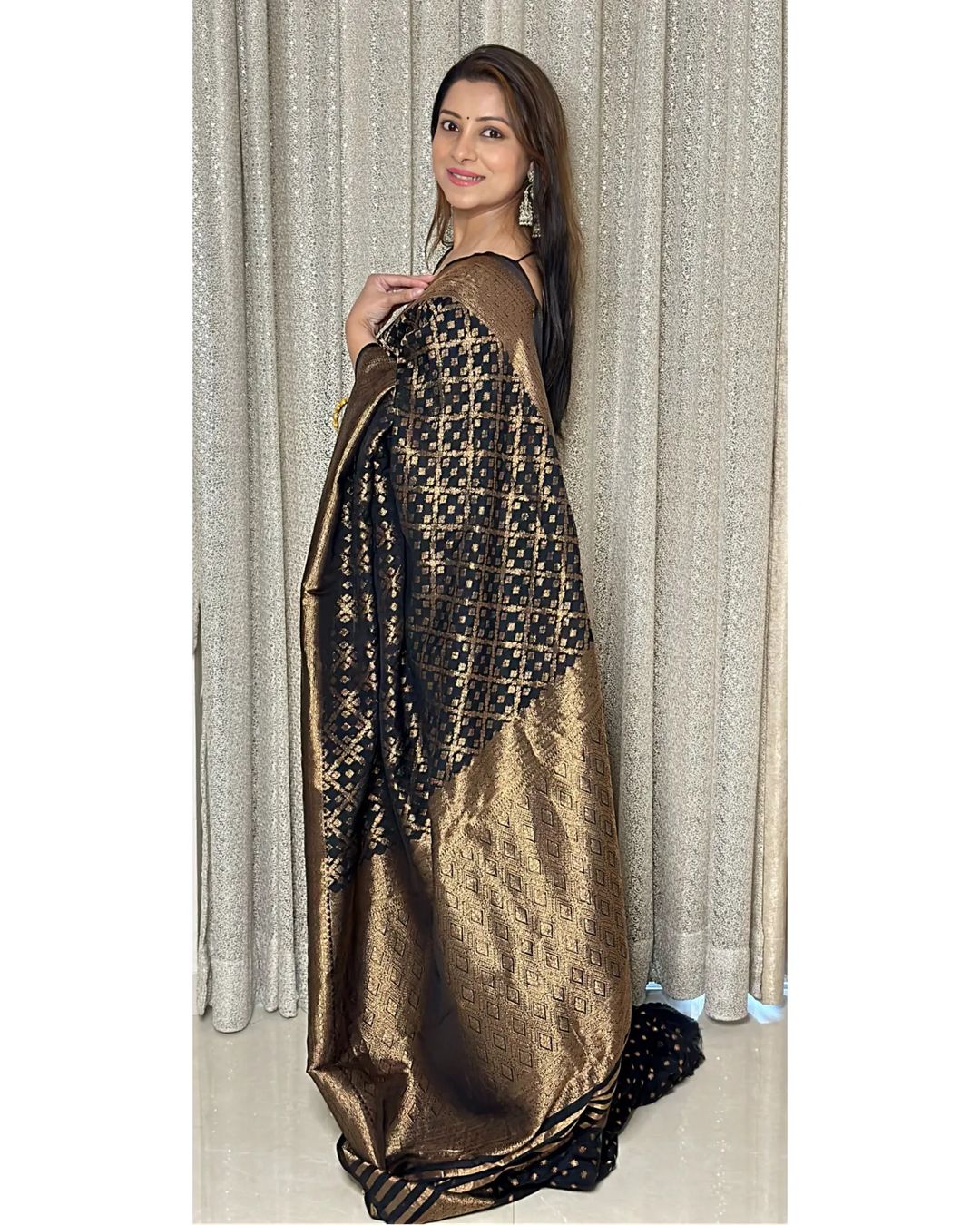 Graceful Black Banarasi Silk Saree With Exquisite Blouse Piece