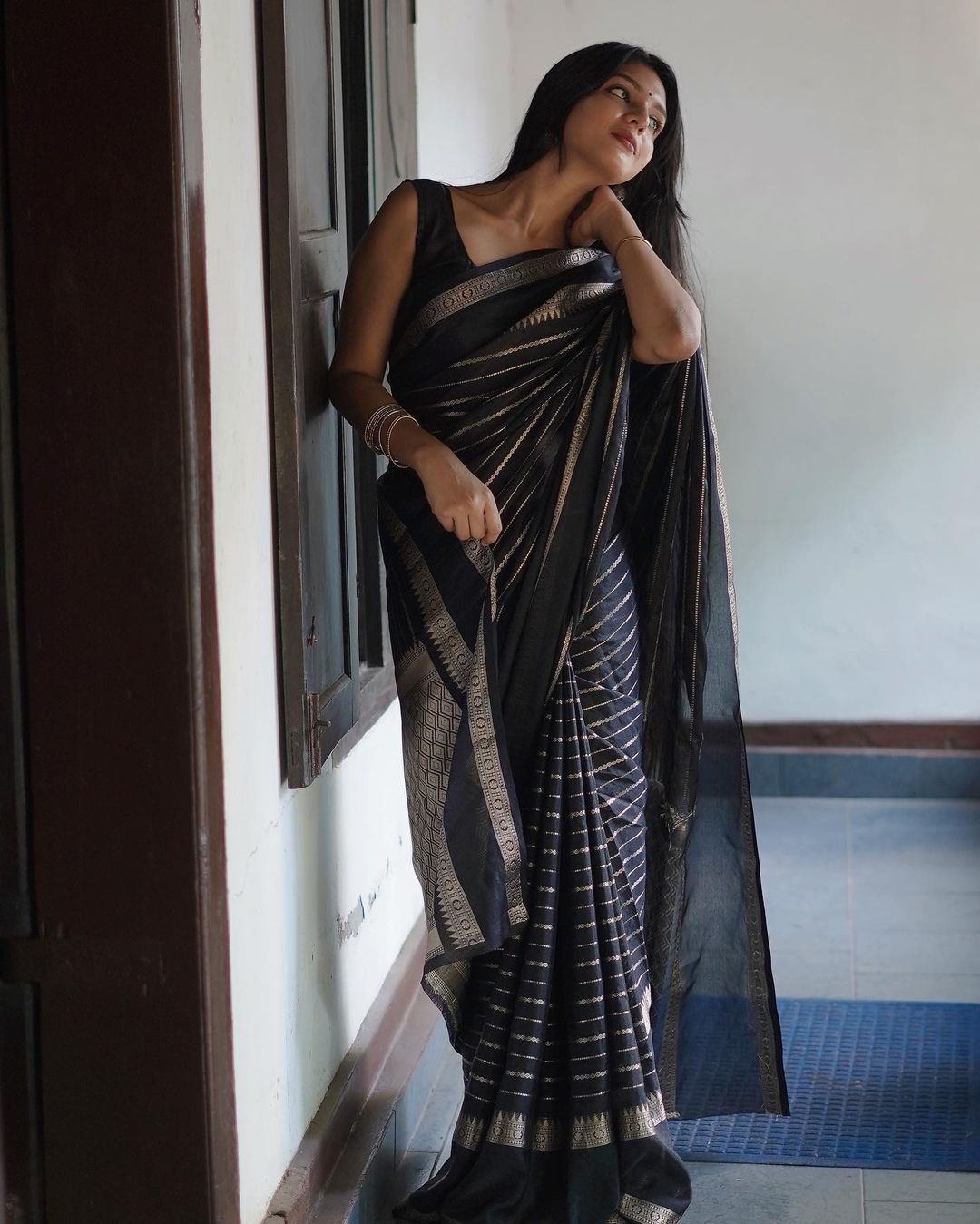 Blissful Black Soft Silk Saree With Ailurophile Blouse Piece