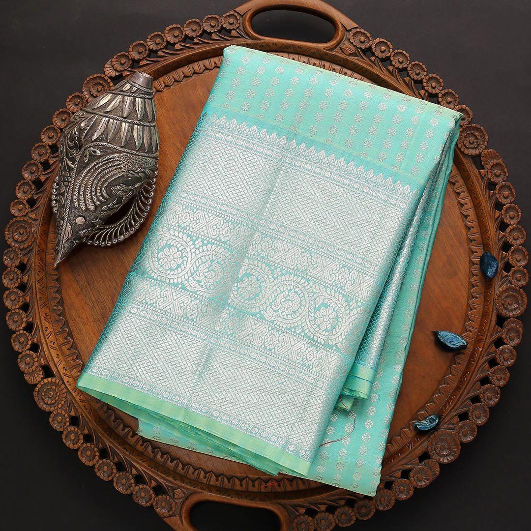 Attractive Firozi Soft Silk Saree With Outstanding Blouse Piece