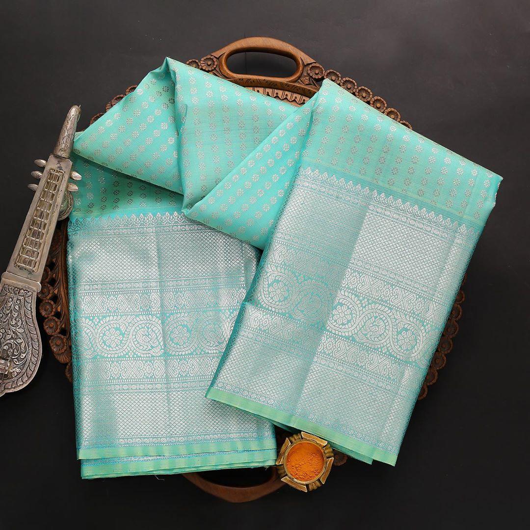 Attractive Firozi Soft Silk Saree With Outstanding Blouse Piece