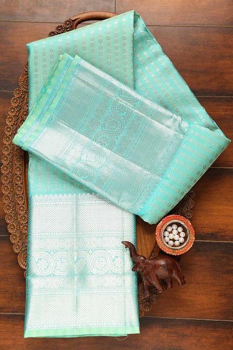 Attractive Firozi Soft Silk Saree With Outstanding Blouse Piece