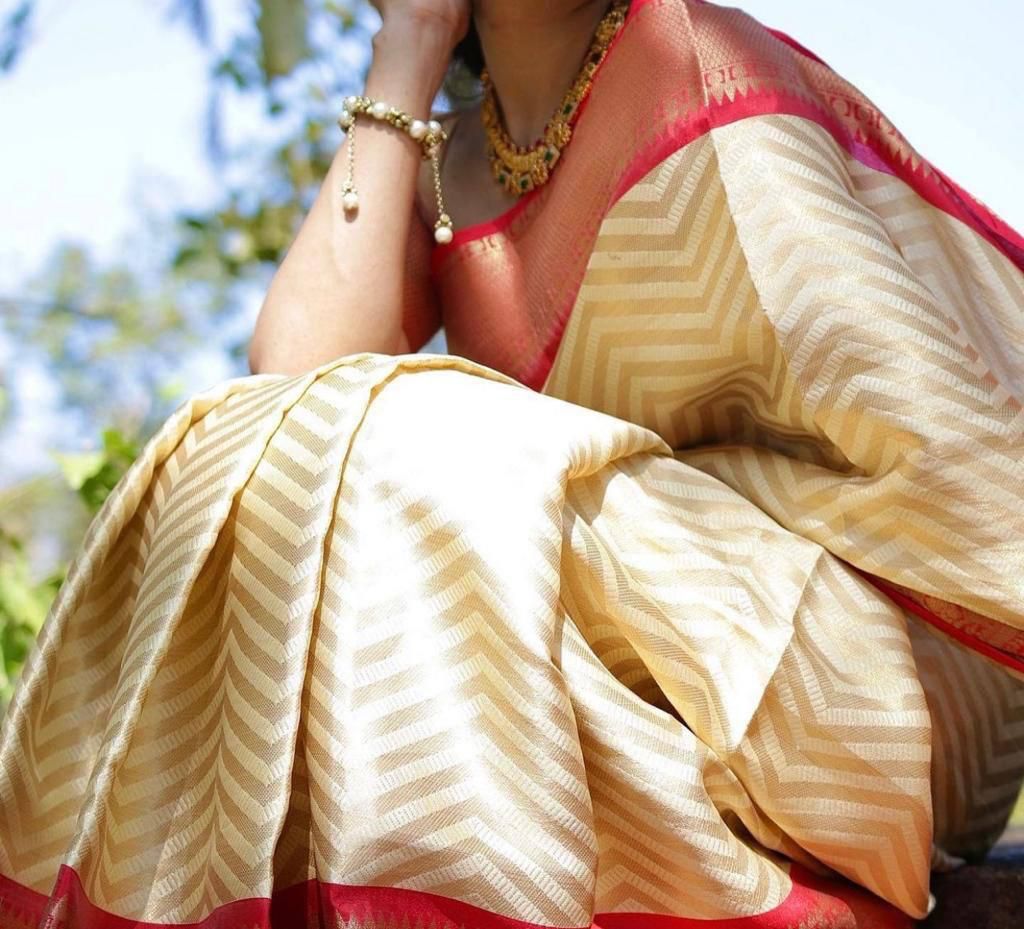 Aesthetic Cream Soft Silk Saree With Gratifying Blouse Piece