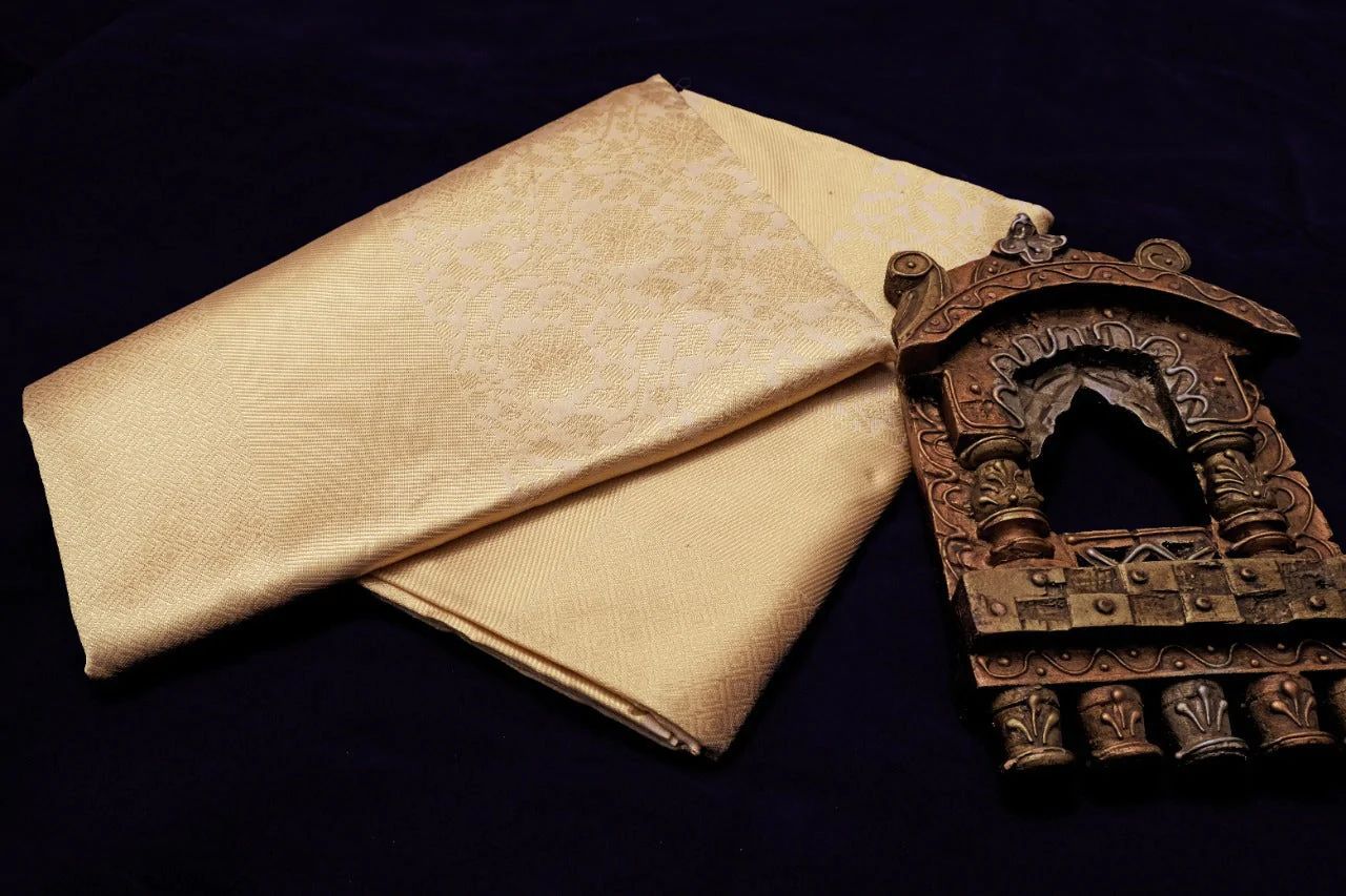 Charming Cream Kanjivaram Silk Saree With Fugacious Blouse Piece