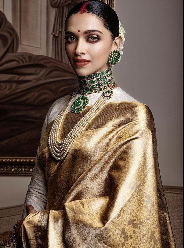 Charming Cream Kanjivaram Silk Saree With Fugacious Blouse Piece