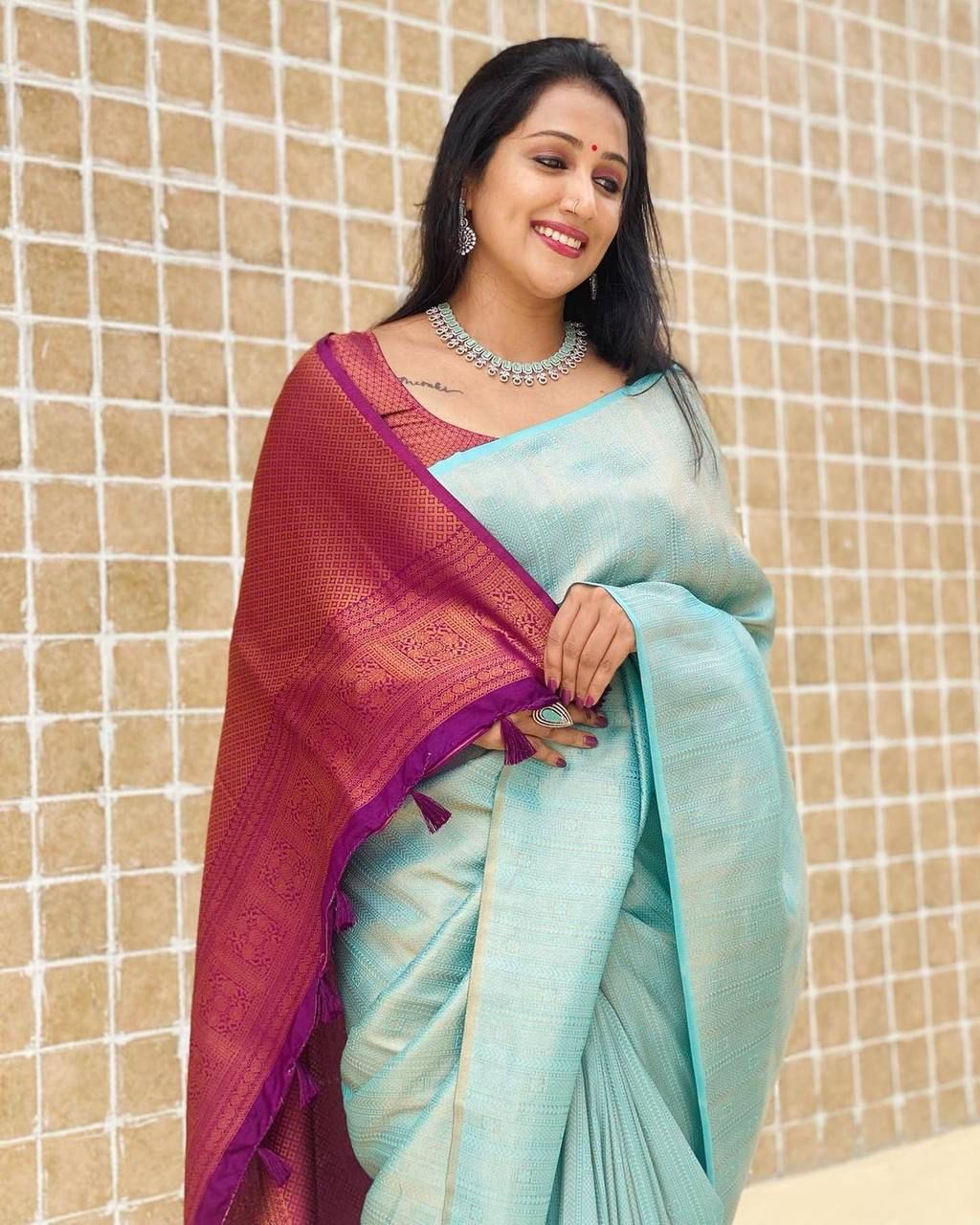 Classy Firozi Kanjivaram Silk Saree With Uplifting Blouse Piece