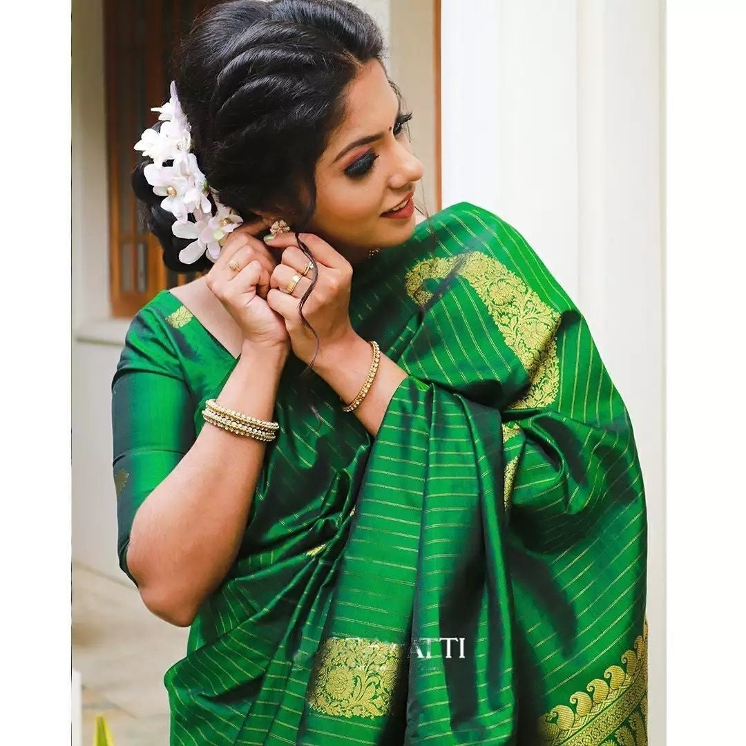 Adorable Green Soft Silk Saree With Fugacious Blouse Piece