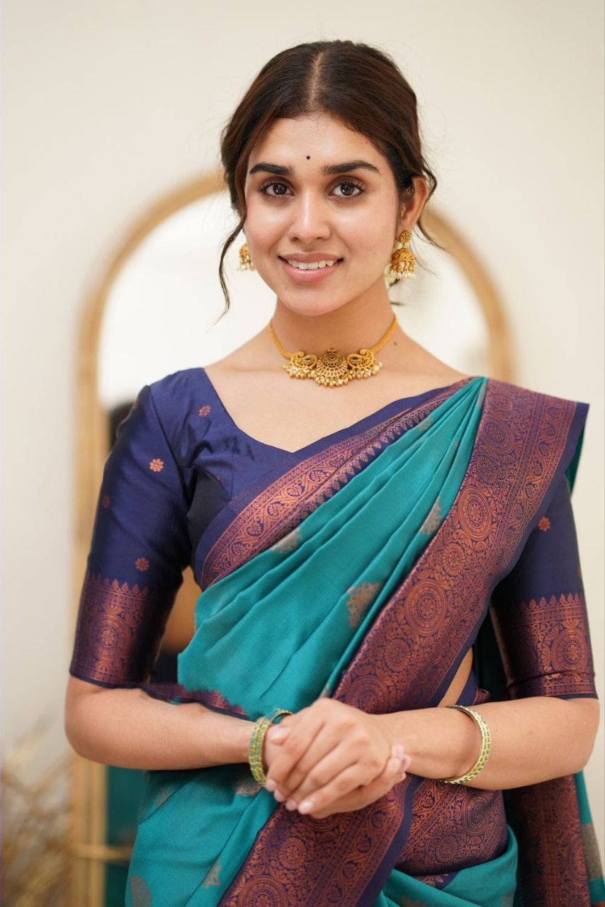 Statuesque Firozi Soft Silk Saree With Dignified Blouse Piece